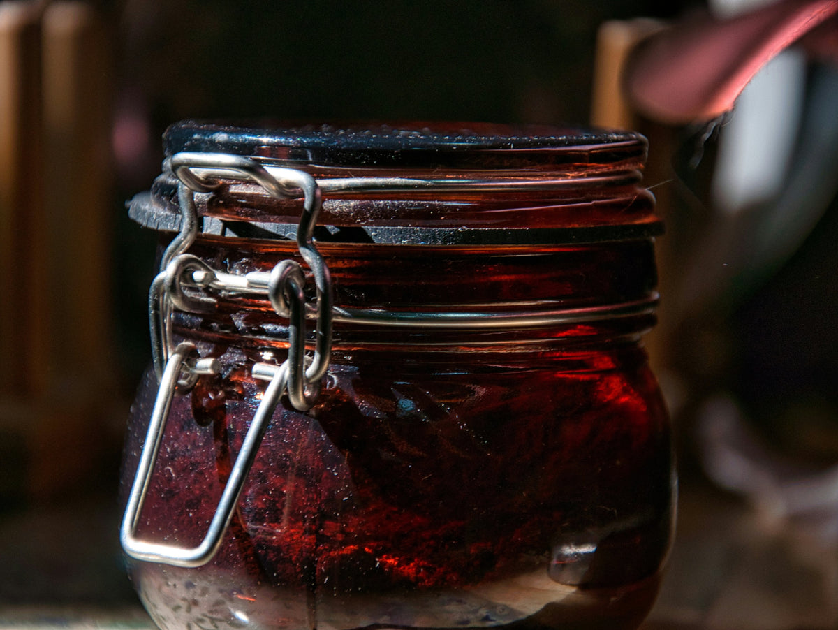 Jars of French artisan jam on a breakfast table