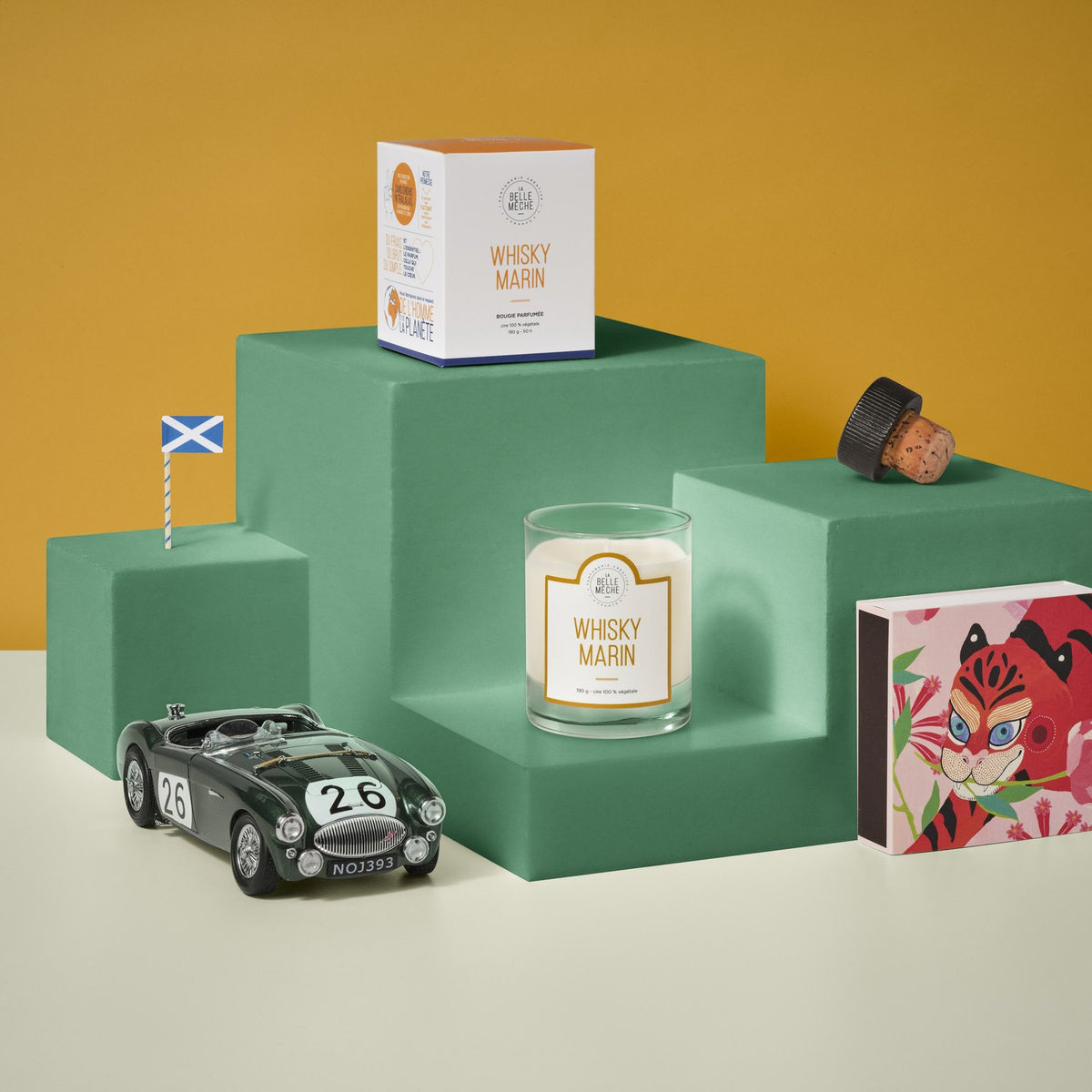 La Belle Mèche Peated Whisky scented candle with a Scottish flag