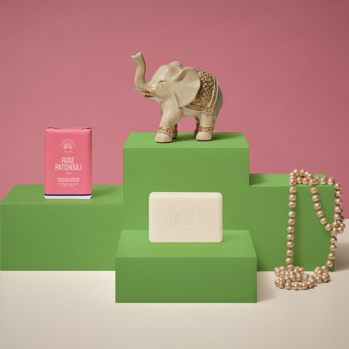 La Belle Mèche Rose Patchouli soap bar with an elephant figurine