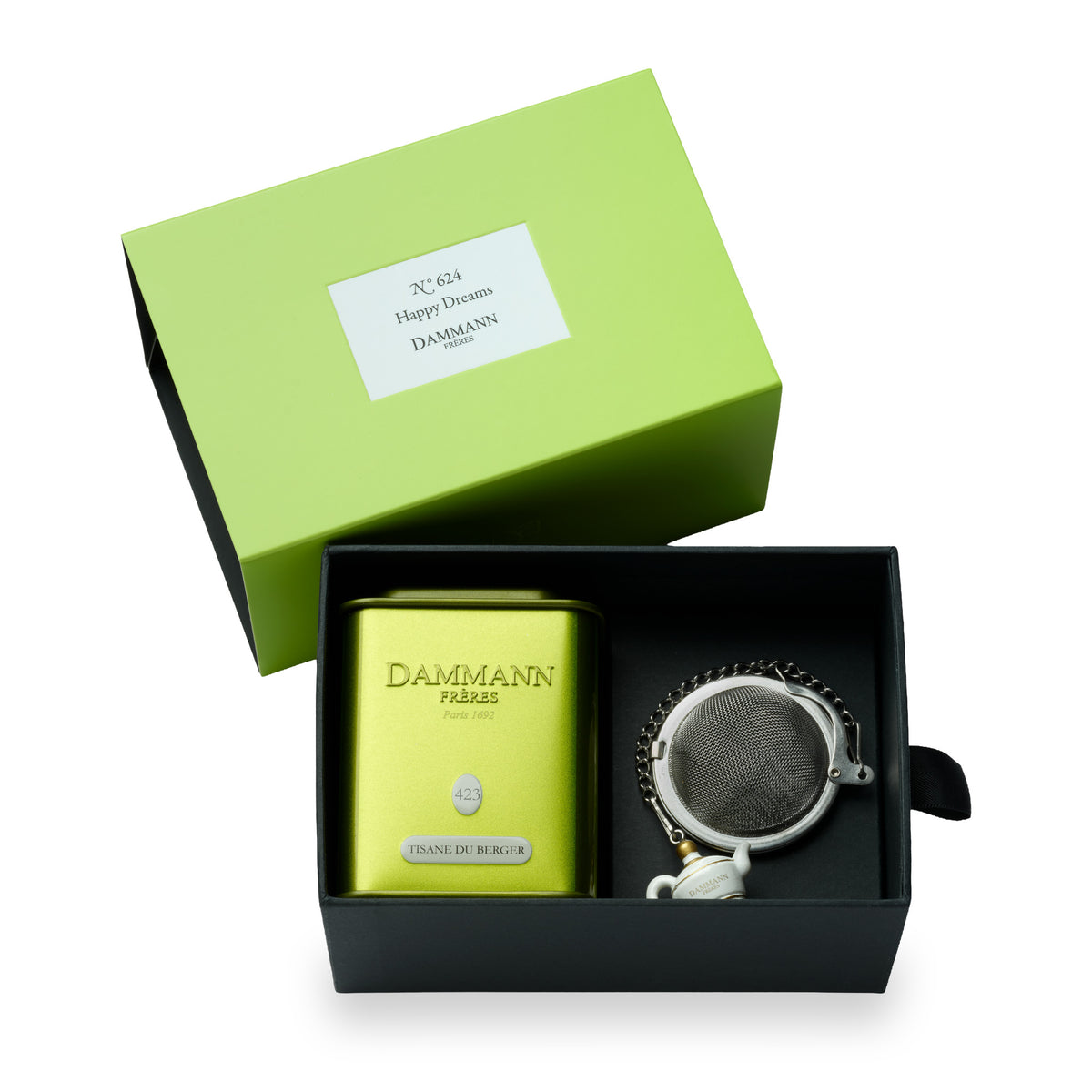 Coffret N°624 Happy Dreams de Dammann Frères, ouvert avec une boîte de thé et une boule à thé