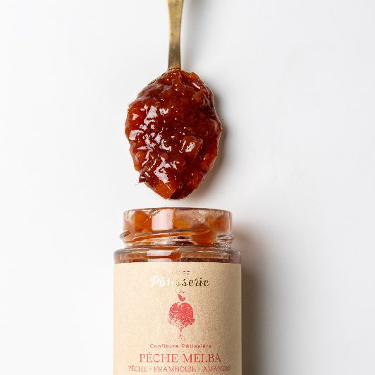 Maison Perrotte Peach Melba jam beside the dessert that inspired it