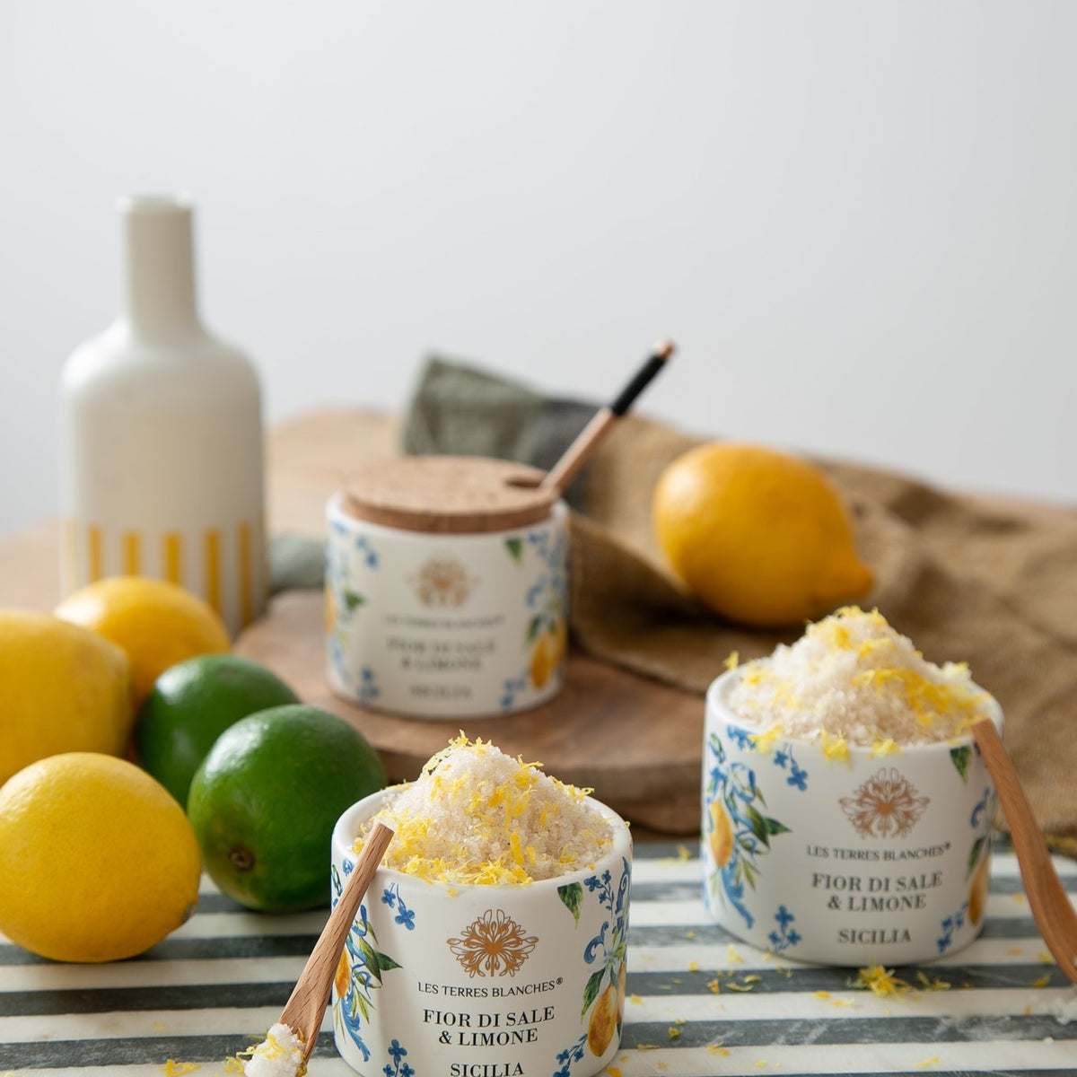 Les Terres Blanches Sicilian fleur de sel with lemon, with fresh lemons and limes