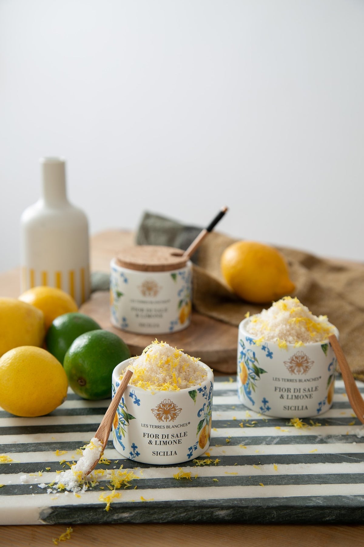 Les Terres Blanches Sicilian fleur de sel with lemon, with fresh lemons and limes